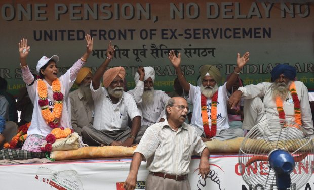 Ex-servicemen protesting for One Rank One Pension at Jantar Mantar in New Delhi on Saturday (Photo: PTI) Ex-servicemen protesting for One Rank One Pension at Jantar Mantar in New Delhi on Saturday (Photo: PTI)
